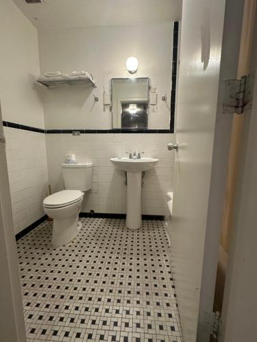 Habitación Doble con 2 camas dobles - No fumadores del hotel Mark Twain Motor Inn. Foto 1