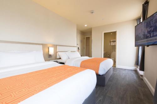 Habitación Doble - 2 camas dobles del hotel Romana Hotel - NYC. Foto 9