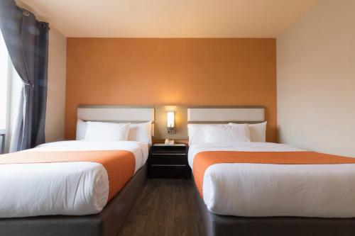 Habitación Doble - 2 camas dobles del hotel Romana Hotel - NYC. Foto 1