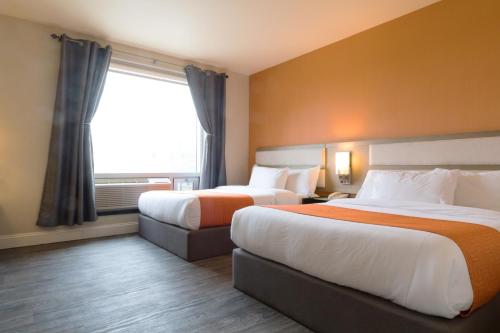 Habitación Doble - 2 camas dobles del hotel Romana Hotel - NYC. Foto 2