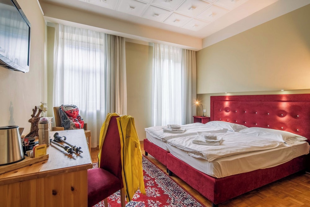 Suite del hotel Auronzo Dolomites, Affiliated by Melia