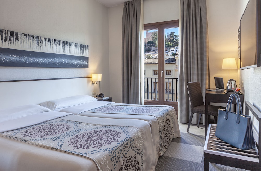 Habitación superior con 1 cama doble o 2 individuales del hotel Macià Plaza