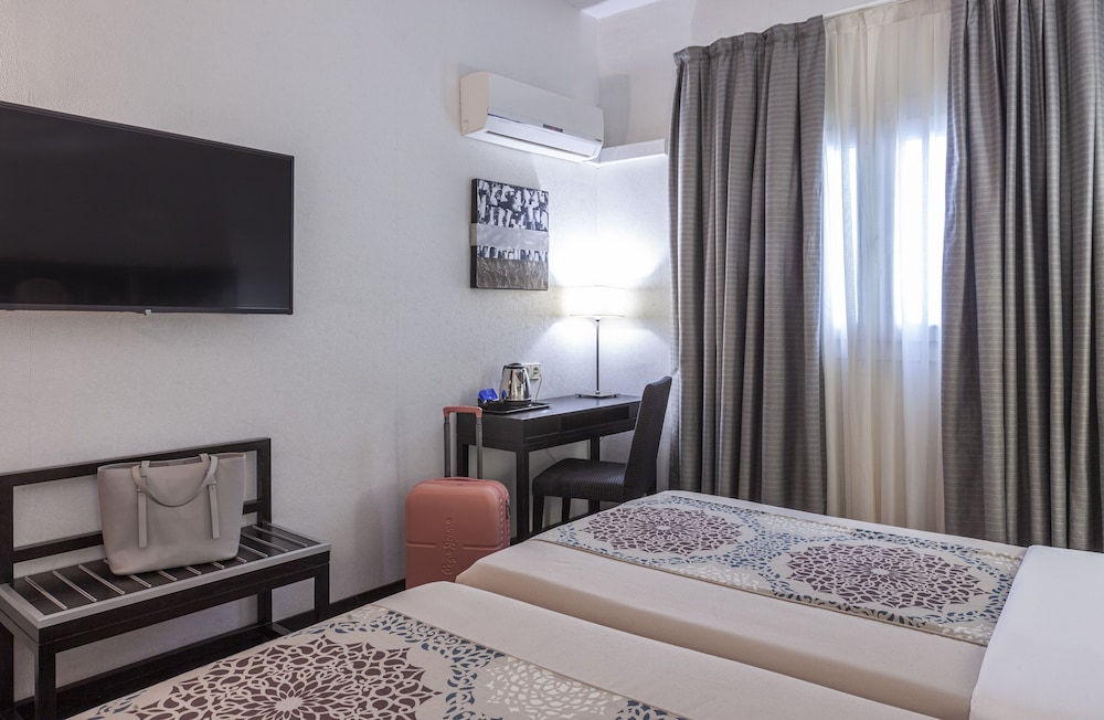Habitación con 1 cama doble o 2 individuales del hotel Macià Plaza. Foto 2