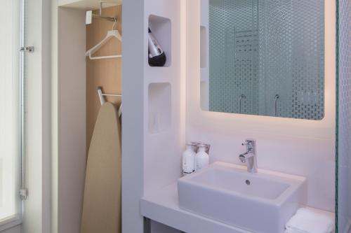 Alojamiento Premium - Cama extragrande - Adaptado para personas con movilidad reducida del hotel Yotel Washington Dc. Foto 4