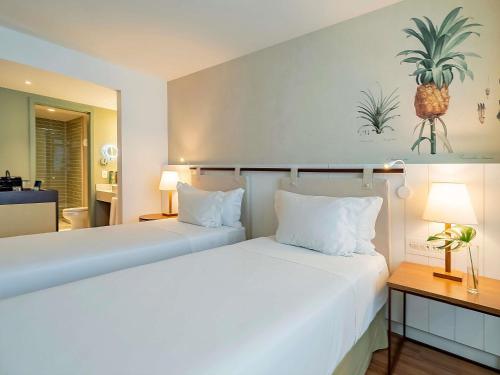 Habitación Doble Premium Executive con vistas al mar - 2 camas individuales del hotel Grand Mercure Rio De Janeiro Copacabana. Foto 5