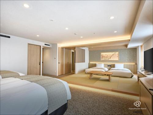 Habitación Cuádruple del hotel Daiwa Roynet Ginza Premier. Foto 2