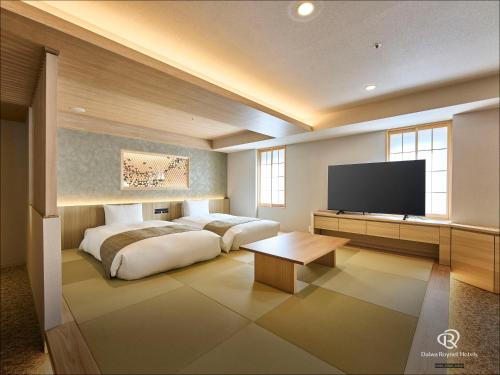Habitación Cuádruple del hotel Daiwa Roynet Ginza Premier. Foto 3
