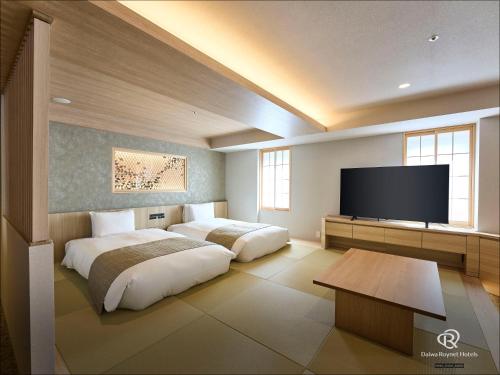 Habitación Cuádruple del hotel Daiwa Roynet Ginza Premier. Foto 18