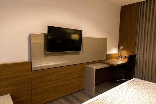 Habitación Triple Superior del hotel JL by Bourbon. Foto 2