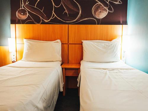 Habitación Doble Estándar - 2 camas del hotel Ibis Recife Aeroporto. Foto 3