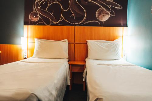 Habitación Doble Estándar - 2 camas del hotel Ibis Recife Aeroporto. Foto 8
