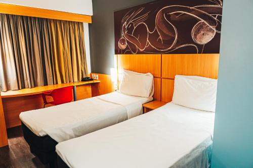 Habitación Doble Estándar - 2 camas del hotel Ibis Recife Aeroporto. Foto 9
