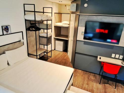 Habitación Familiar Clásica del hotel Ibis Recife Aeroporto. Foto 1