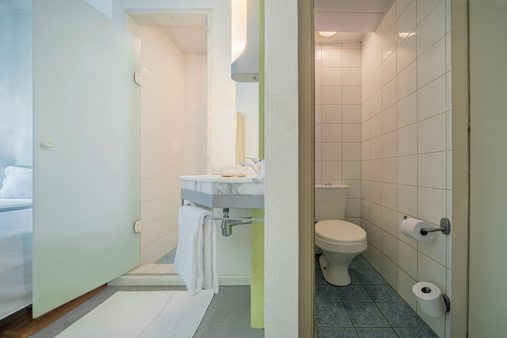 Habitación Standard con 2 camas individuales del hotel Ibis Budget Sao Paulo Jardins. Foto 11