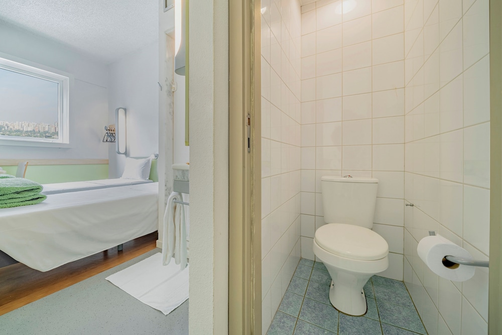 Habitación Standard con 2 camas individuales del hotel Ibis Budget Sao Paulo Jardins. Foto 12