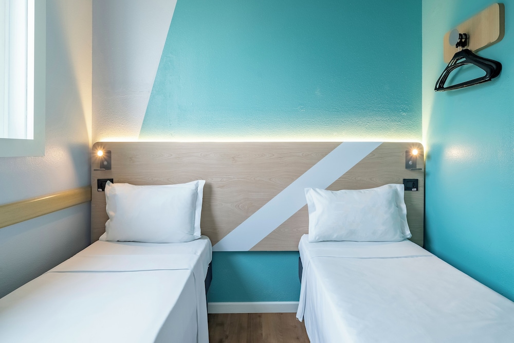 Habitación Superior doble con 2 camas individuales del hotel Ibis Budget Sao Paulo Jardins. Foto 3