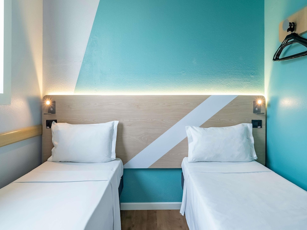 Habitación Superior doble con 2 camas individuales del hotel Ibis Budget Sao Paulo Jardins. Foto 9
