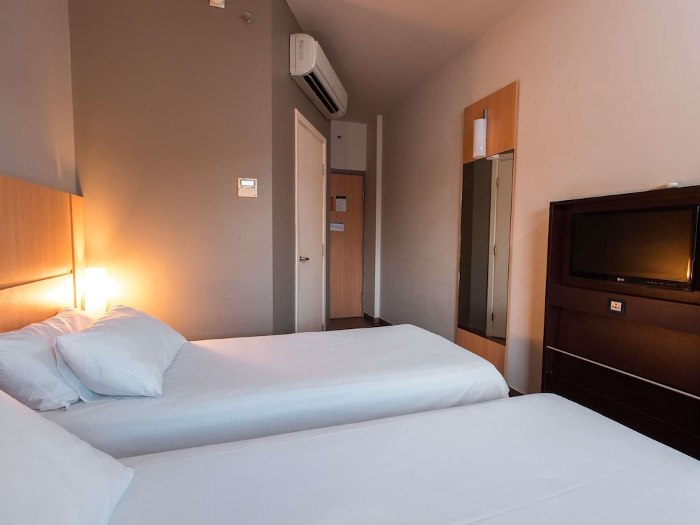Habitación Standard con dos camas individuales del hotel Ibis Presidente Prudente Manoel Goulart. Foto 2