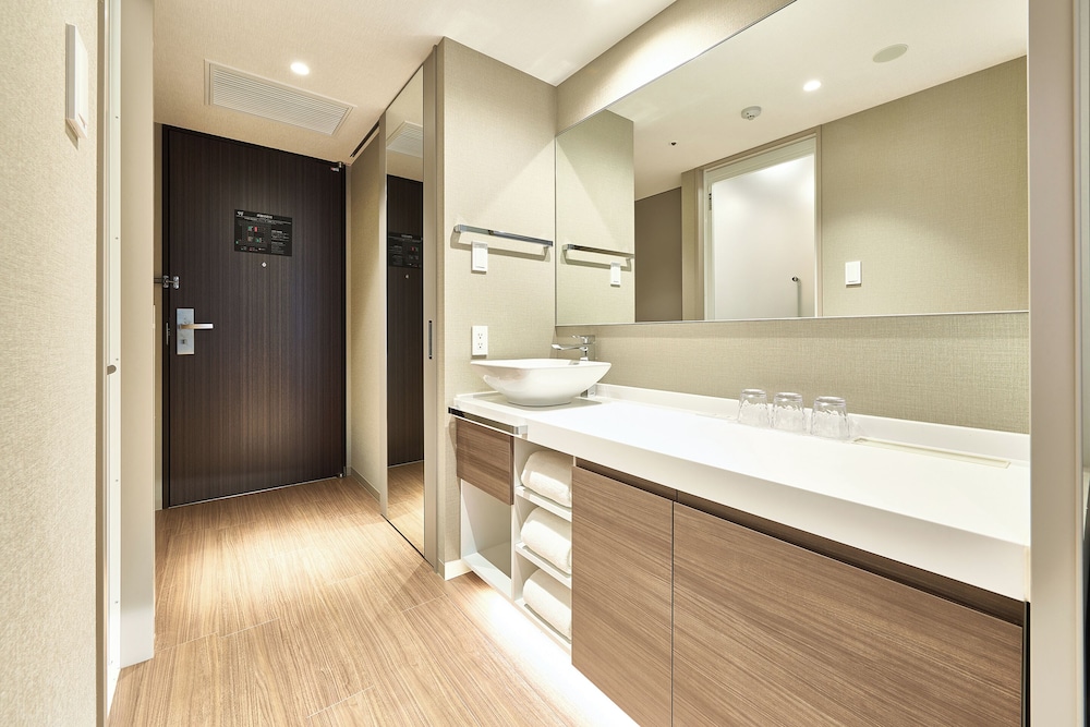 Habitación triple con 3 camas individuales del hotel Vischio Kyoto By Granvia. Foto 4