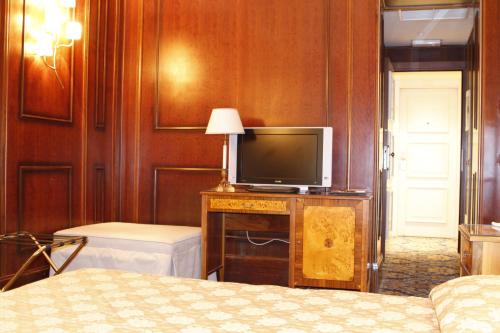 Habitación Triple del hotel Boutique Trevi. Foto 1