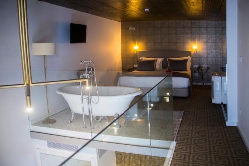 Suite Dúplex con baño del hotel Thomar Boutique. Foto 2