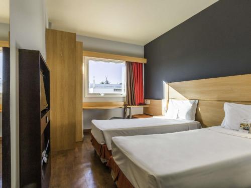 Habitación Doble Estándar - 2 camas del hotel Ibis Barretos. Foto 3
