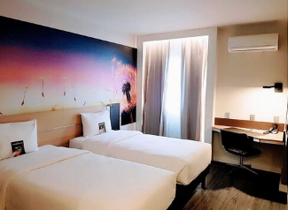 Habitación Superior con Dos Camas Individuales del hotel Novotel Itajai. Foto 1