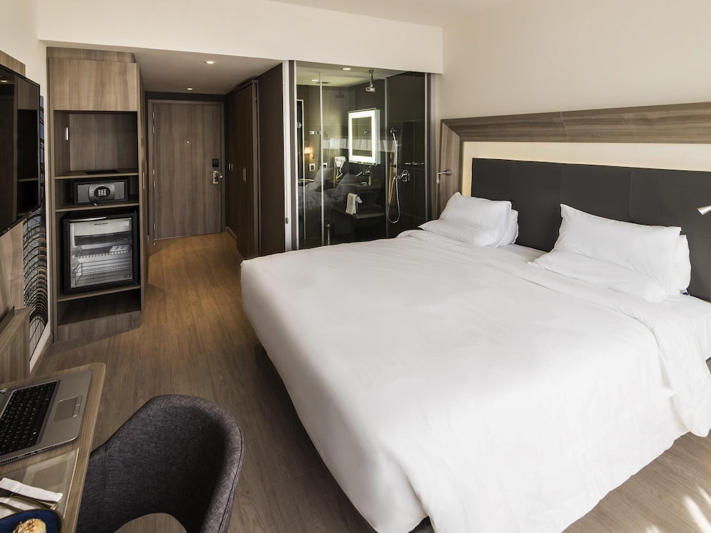 Habitación Familiar con 1 cama doble y sofá cama del hotel Novotel São Paulo Berrini. Foto 6