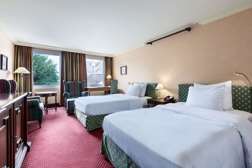 Habitación cuádruple familiar del hotel NH Brugge