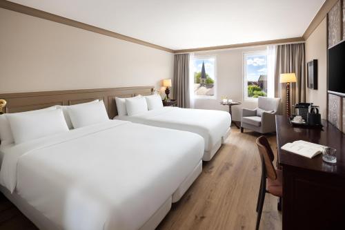 Quardruple Family Room del hotel NH Brugge. Foto 4