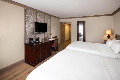 Quardruple Family Room del hotel NH Brugge. Foto 5