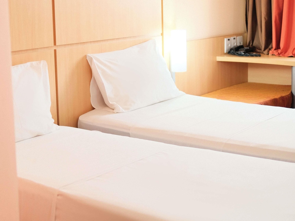 Habitación Standard con 2 camas individuales del hotel Ibis Feira De Santana. Foto 7
