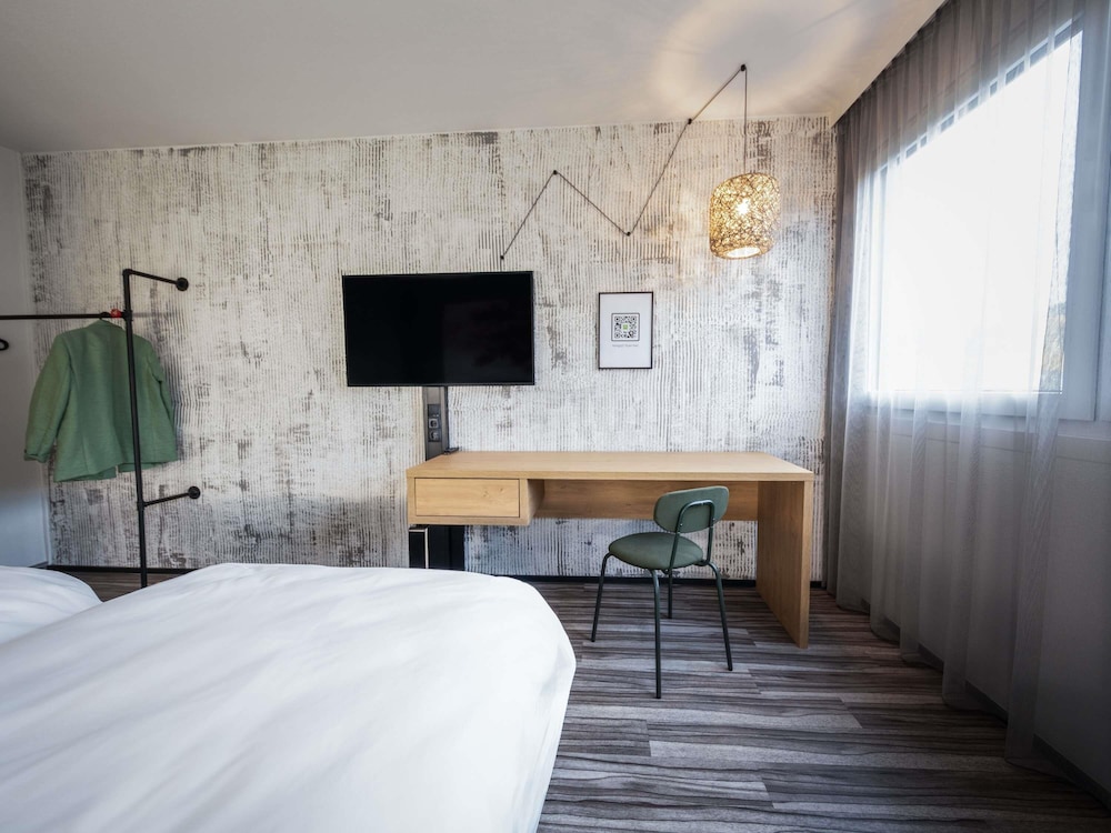 Habitación estándar con 2 cómodas camas individuales del hotel Ibis Styles Linz. Foto 1