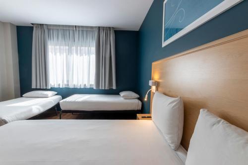 Habitación Familiar del hotel Travelodge Madrid Torrelaguna. Foto 10