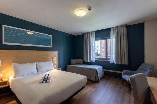 Habitación Familiar del hotel Travelodge Madrid Torrelaguna. Foto 12