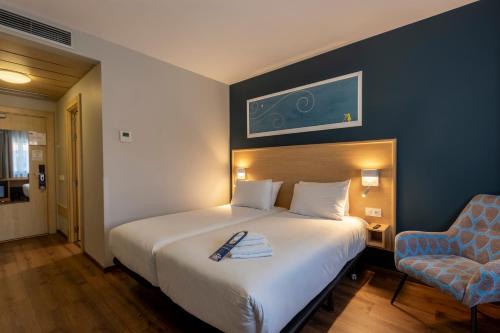 Habitación Doble - 2 camas del hotel Travelodge Madrid Torrelaguna. Foto 9