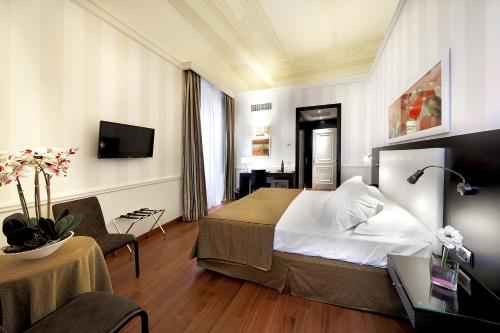 Habitación Doble Deluxe - 1 o 2 camas del hotel Il Principe. Foto 1