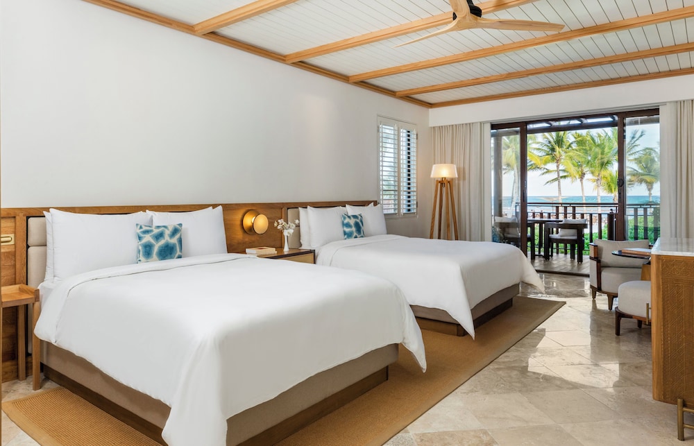 Casita frente a la playa, 2 camas de matrimonio, escalera privada a la playa, servicio de mayordomo del hotel Fairmont Mayakoba. Foto 1