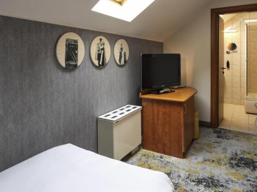 Habitación económica con 1 cama individual del hotel Mercure Sibiu Airport. Foto 2