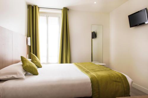 Habitación Doble del hotel Bel Oranger Gare de Lyon. Foto 6