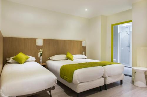 Habitación Triple del hotel Bel Oranger Gare de Lyon. Foto 3