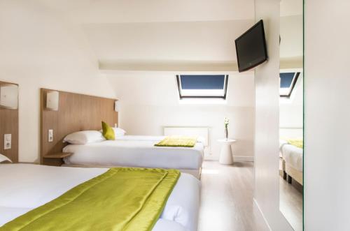 Habitación Familiar del hotel Bel Oranger Gare de Lyon. Foto 2