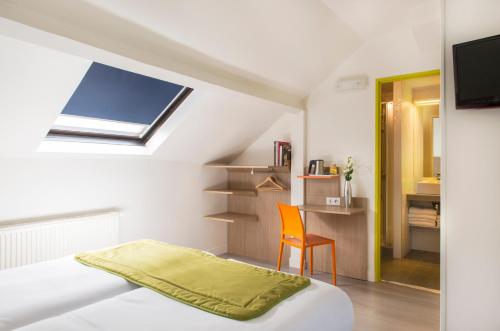 Habitación Familiar del hotel Bel Oranger Gare de Lyon. Foto 6
