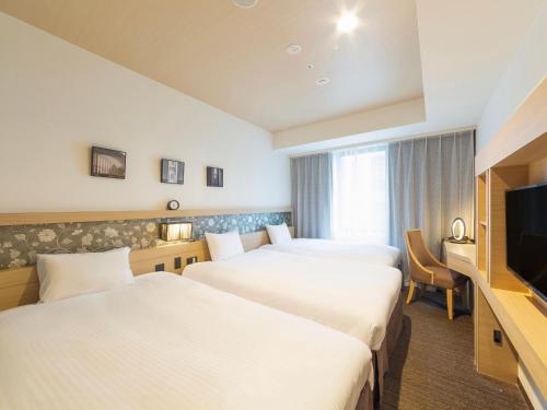 Habitación Triple Estándar - No fumadores del hotel Keihan Yodoyabashi. Foto 3