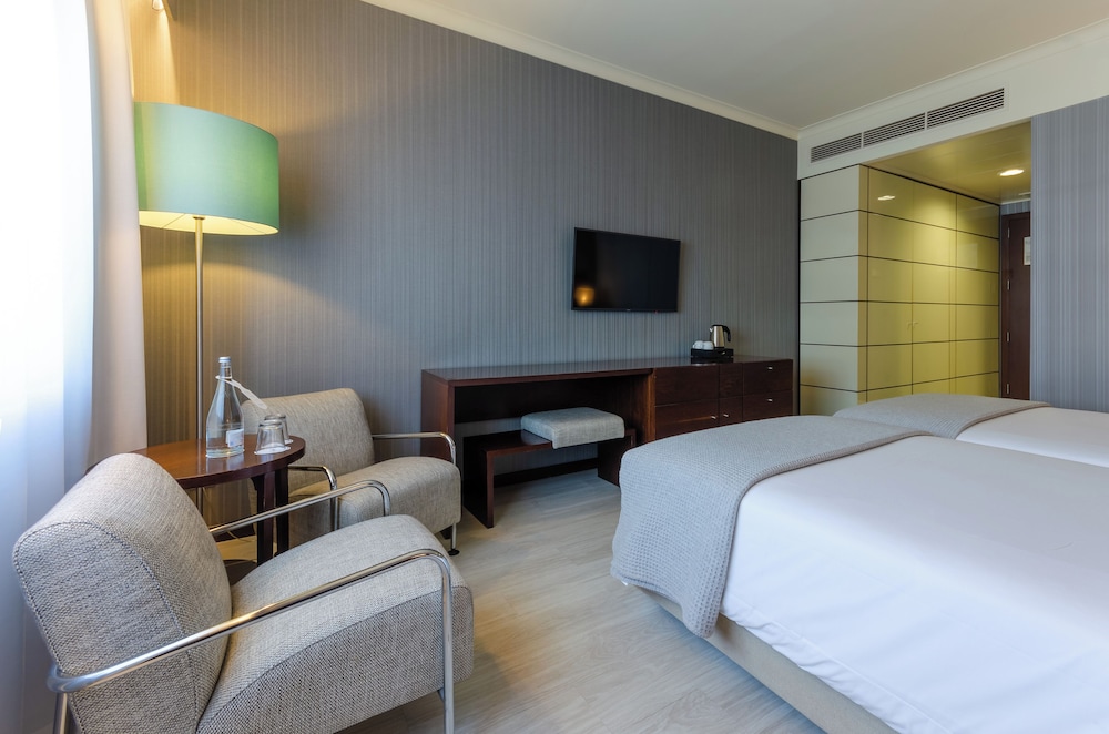 Habitación estándar con 1 cama doble o 2 individuales del hotel Olissippo Oriente. Foto 1