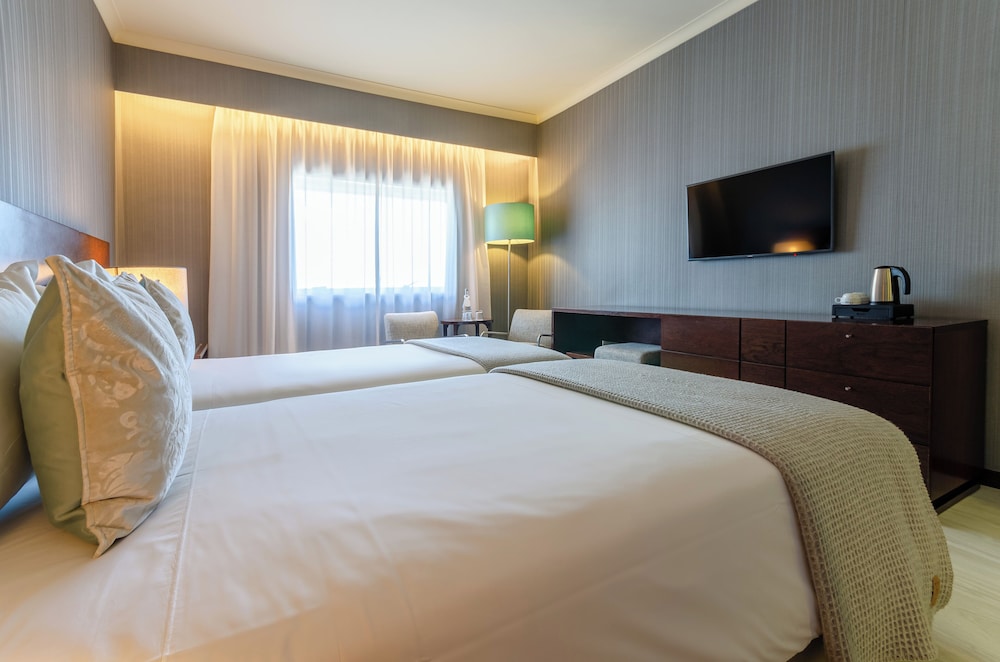 Habitación estándar con 1 cama doble o 2 individuales del hotel Olissippo Oriente. Foto 3