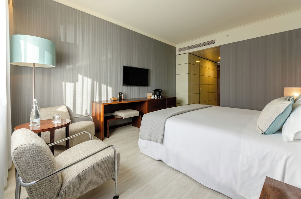 Habitación con 1 cama doble o 2 individuales del hotel Olissippo Oriente. Foto 1