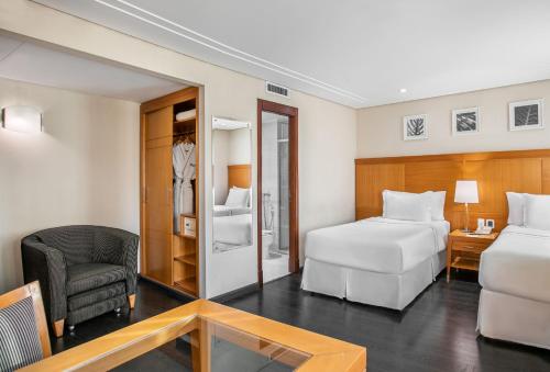 Habitación Doble Deluxe - 2 camas del hotel Melia Jardim Europa. Foto 1