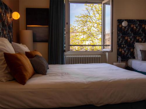 Habitación Confort con cama grande y cama individual adicional del hotel de la Bourse, Mulhouse Gare, Sure Hotel Collection by Best Western
