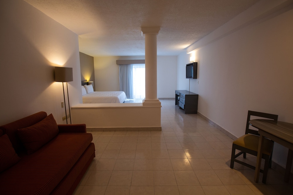 Habitación Junior del hotel Ocean View Cancun Arenas. Foto 1